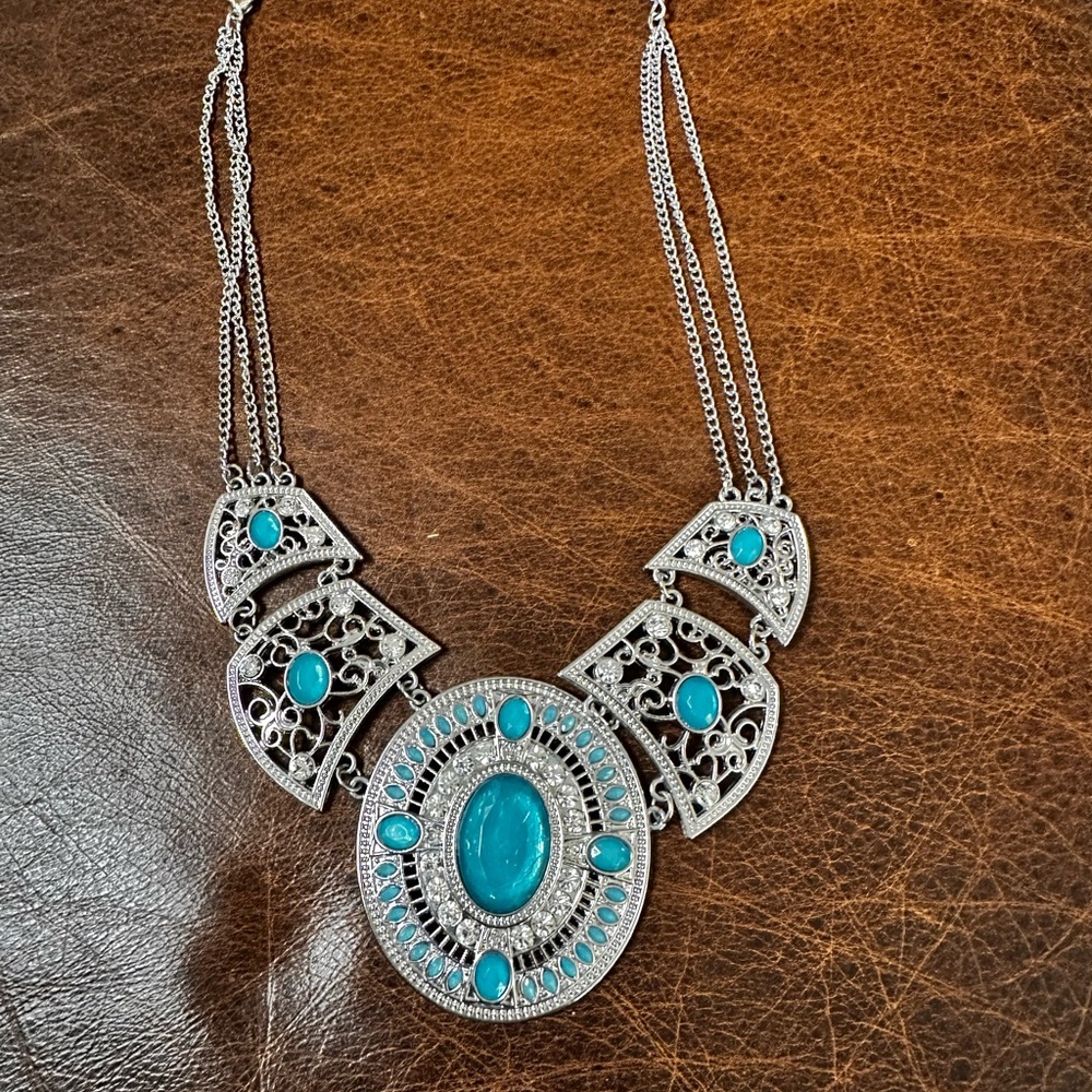 Intricate Silver Necklace with Turquoise color Accents